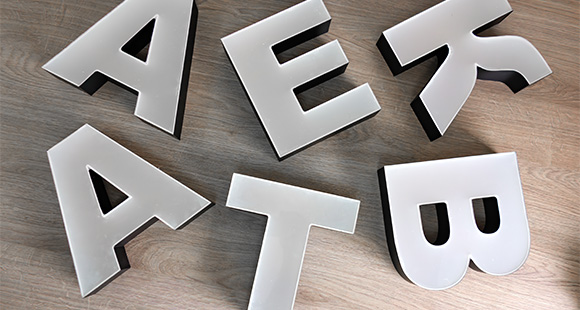 various letters arranged on a flat surface showcasing modern design and typography inspiration for creative projects